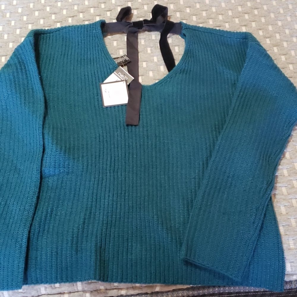 Turquoise sweater with crisscross back